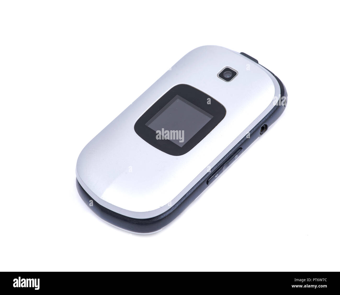 Old used flip cell phone isolated on white background Stock Photo - Alamy