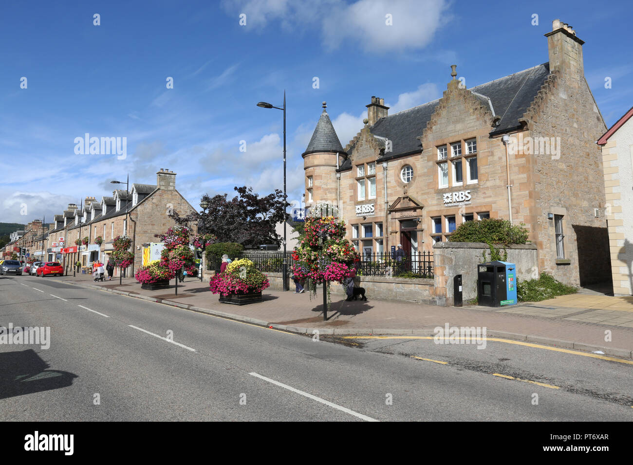 Shops in the High Street in Alness, Ross and Cromarty, Scotland, UK Stock Photo