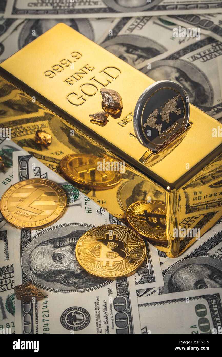 gold bar and cryptocurrency on the background of dollars Stock Photo - Alamy