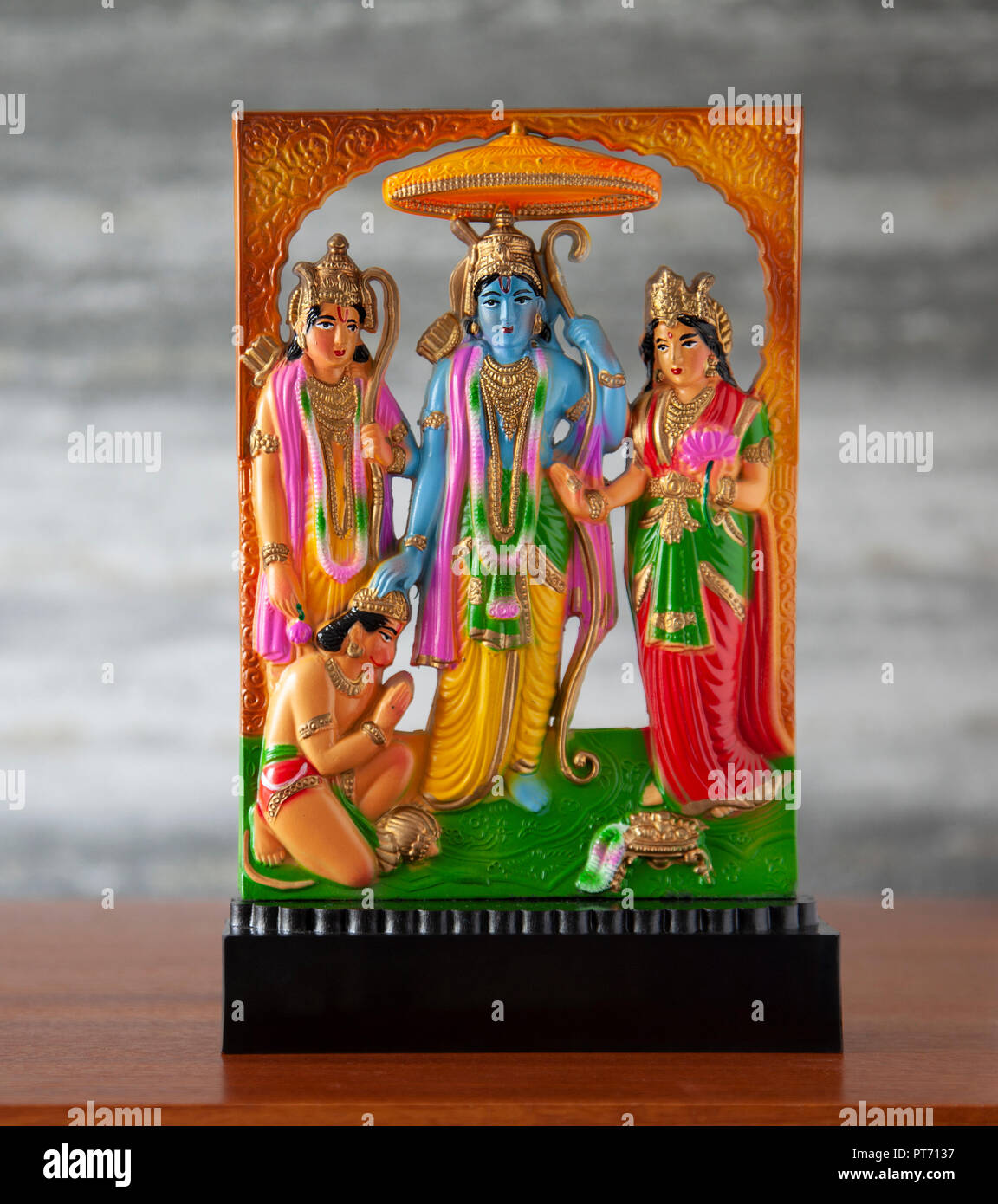 Small moulded plastic, standalone Ram Darbar sculpture, a Hindu religious artefact with Sri Ram, Sita, Lakshman and Hanuman the monkey god. Ramayana, Stock Photo