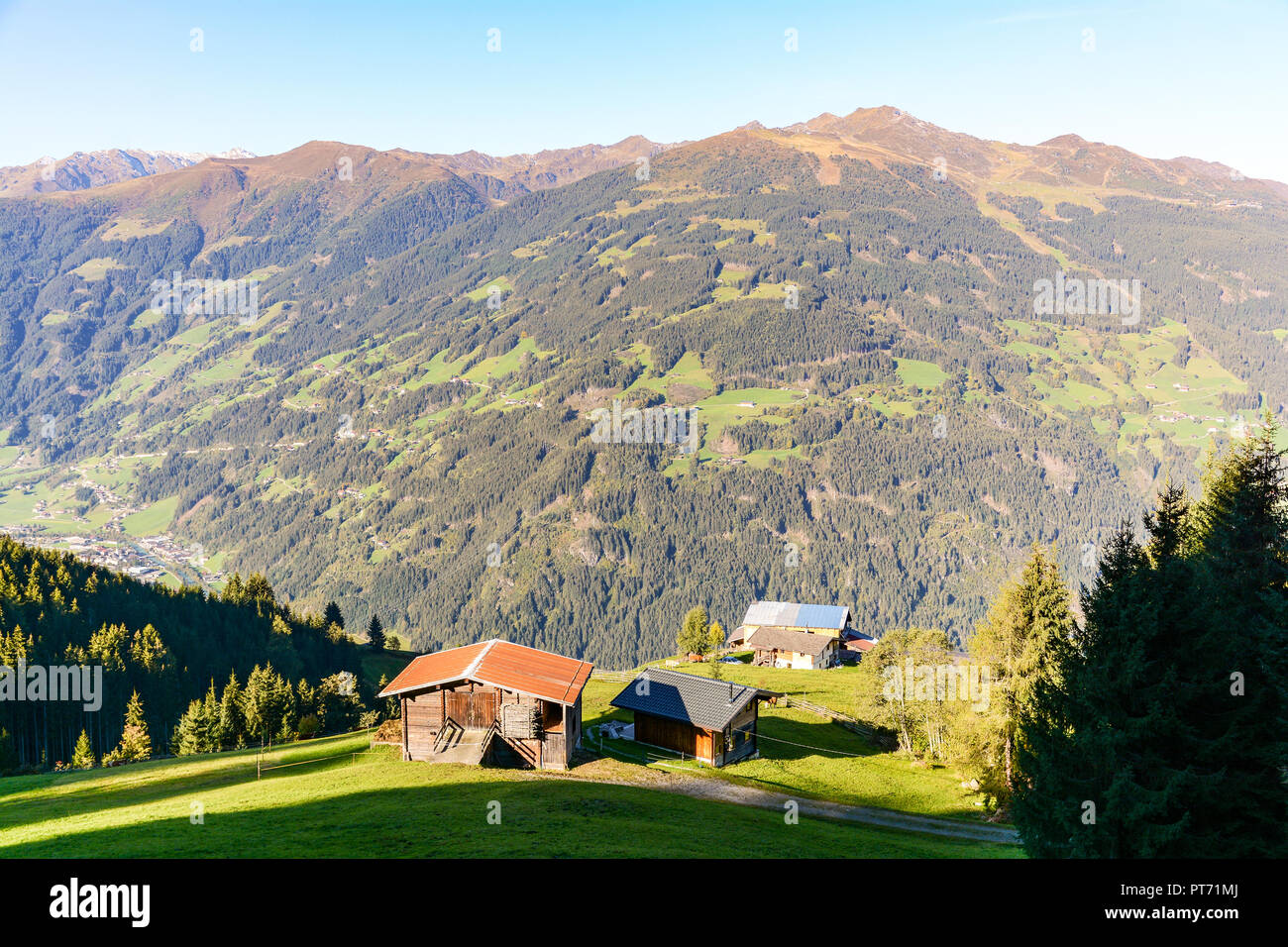 Alpine pasture hike to an old wooden barn with mountain meadow in the austrian alps, Zillertal Austria Stock Photo