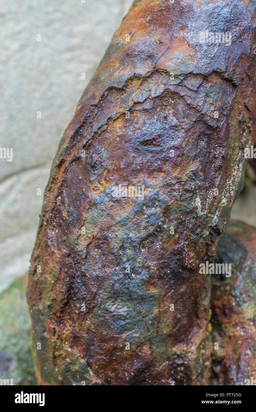 Thick rust encrustation on very heavy duty mooring chain. Rust is a form of  iron oxide. Metaphor for corrosion, weak link, weak point, weakness Stock  Photo - Alamy