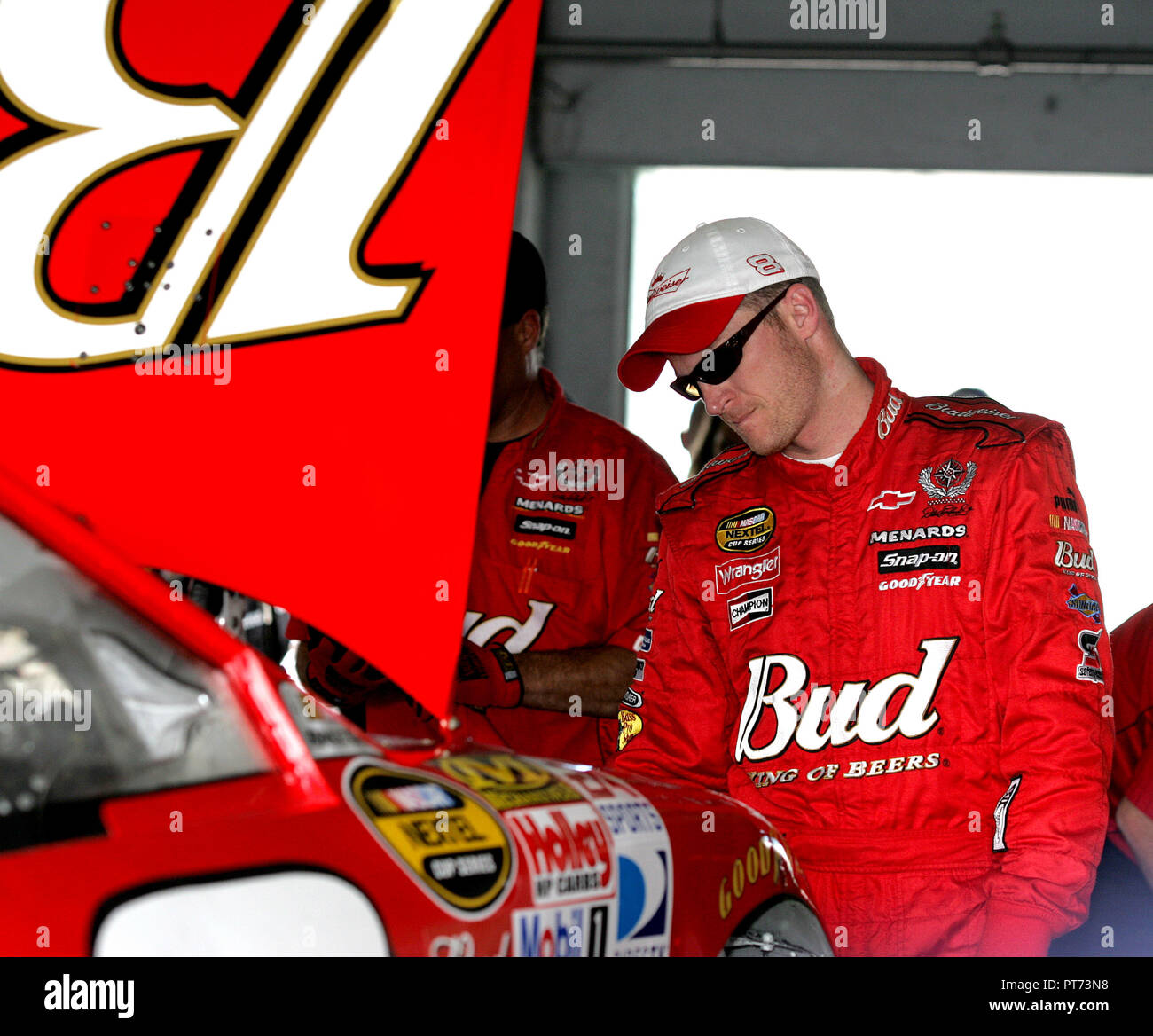 Dale Earnhardt Jr Waits In His Garage Prior The Nextel Cup Ford