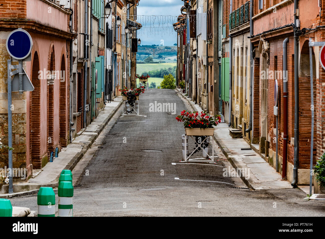 Typical street of the old country village Saint Yvars with the French countryside of the Midi Pyrénées region. Pamiers France Stock Photo