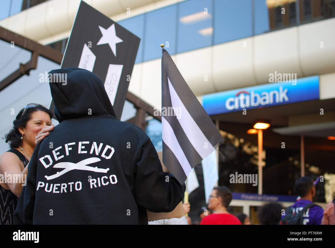 A solidarity rally for Puerto Rico after Hurricane Maria outside Citibank in downtown Oakland on Oct. 4, 2017. Stock Photo