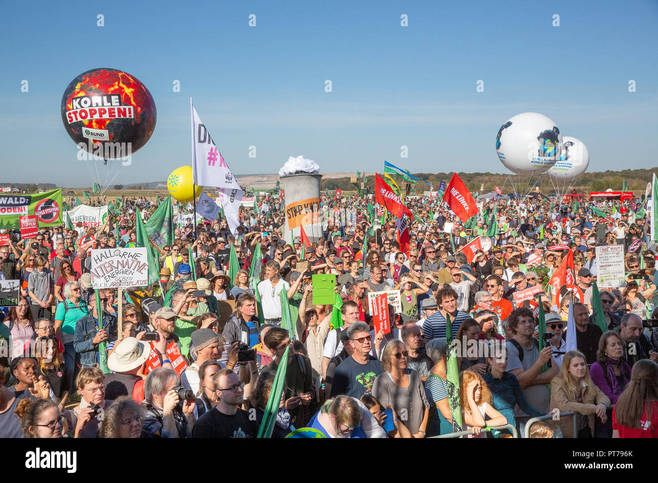 Hambacher, Germany. 6th October 2018. On Saturday (06.10.18) 50,000 people protested with banners, posters and balloons at the Hambacher Forst near Cologne for more climate protection and against lignite mining. Credit: Guido Schiefer/Alamy Live News Stock Photo
