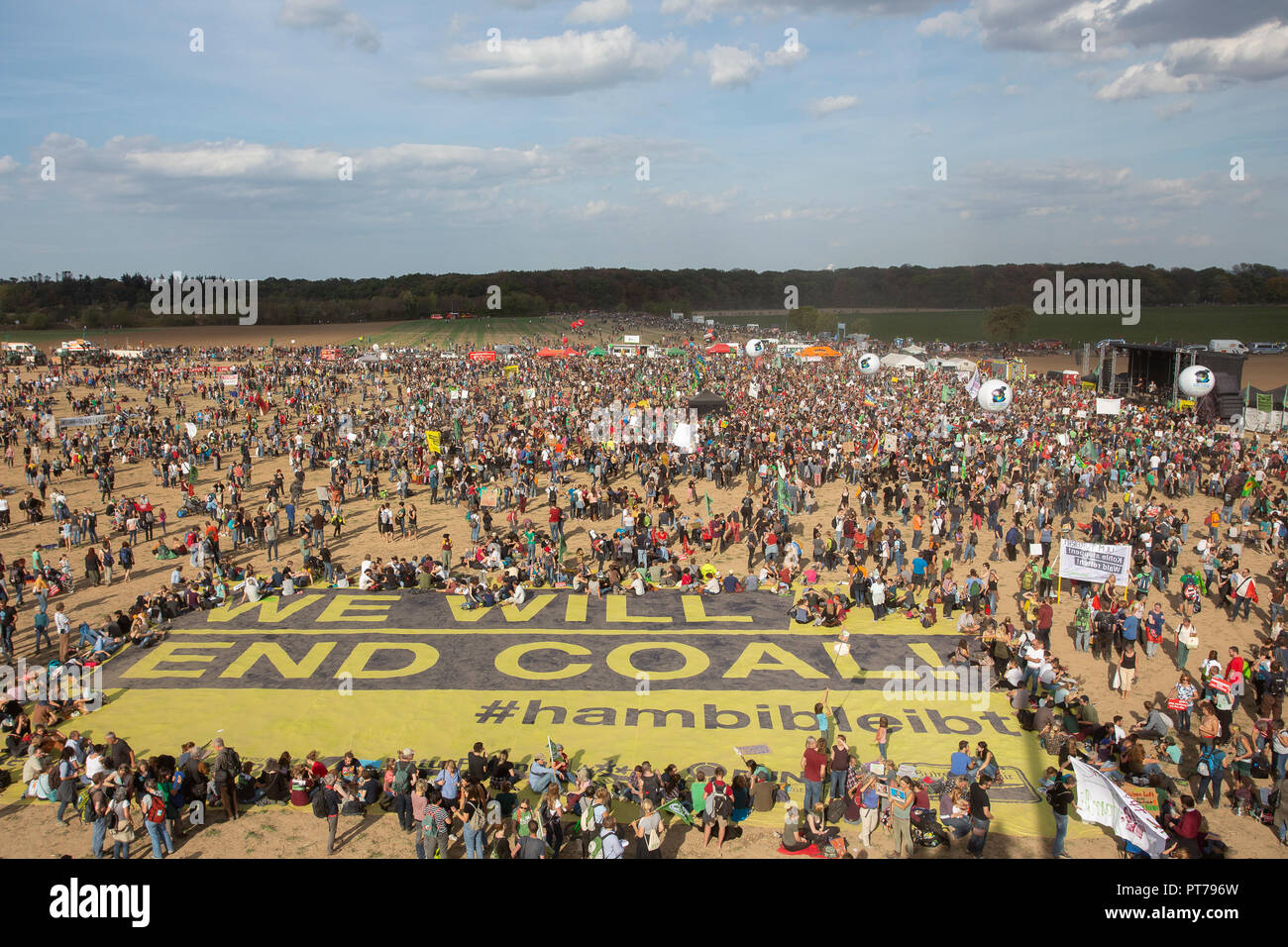 Hamacher Forst, Germany. 6th October 2018. On Saturday (06.10.18) 50,000 people protested with banners, posters and balloons at the Hambacher Forst near Cologne for more climate protection and against lignite mining. Credit: Guido Schiefer/Alamy Live News Stock Photo
