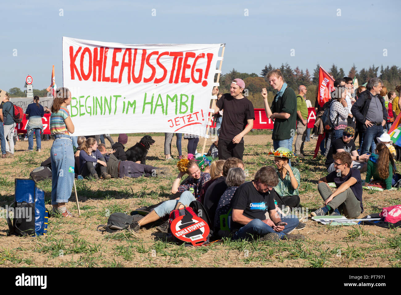 Hamacher Forst, Germany. 6th October 2018. On Saturday (06.10.18) 50,000 people protested with banners, posters and balloons at the Hambacher Forst near Cologne for more climate protection and against lignite mining. Credit: Guido Schiefer/Alamy Live News Stock Photo