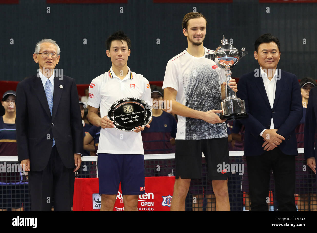 Tokyo, Japan. 6th Oct, 2018. Daniil Medvedev (2nd R) of Russia holds the  trophy of the Rakuten Japan Open tennis championships while runner up Kei  Nishikori (2nd L) holds the plate in
