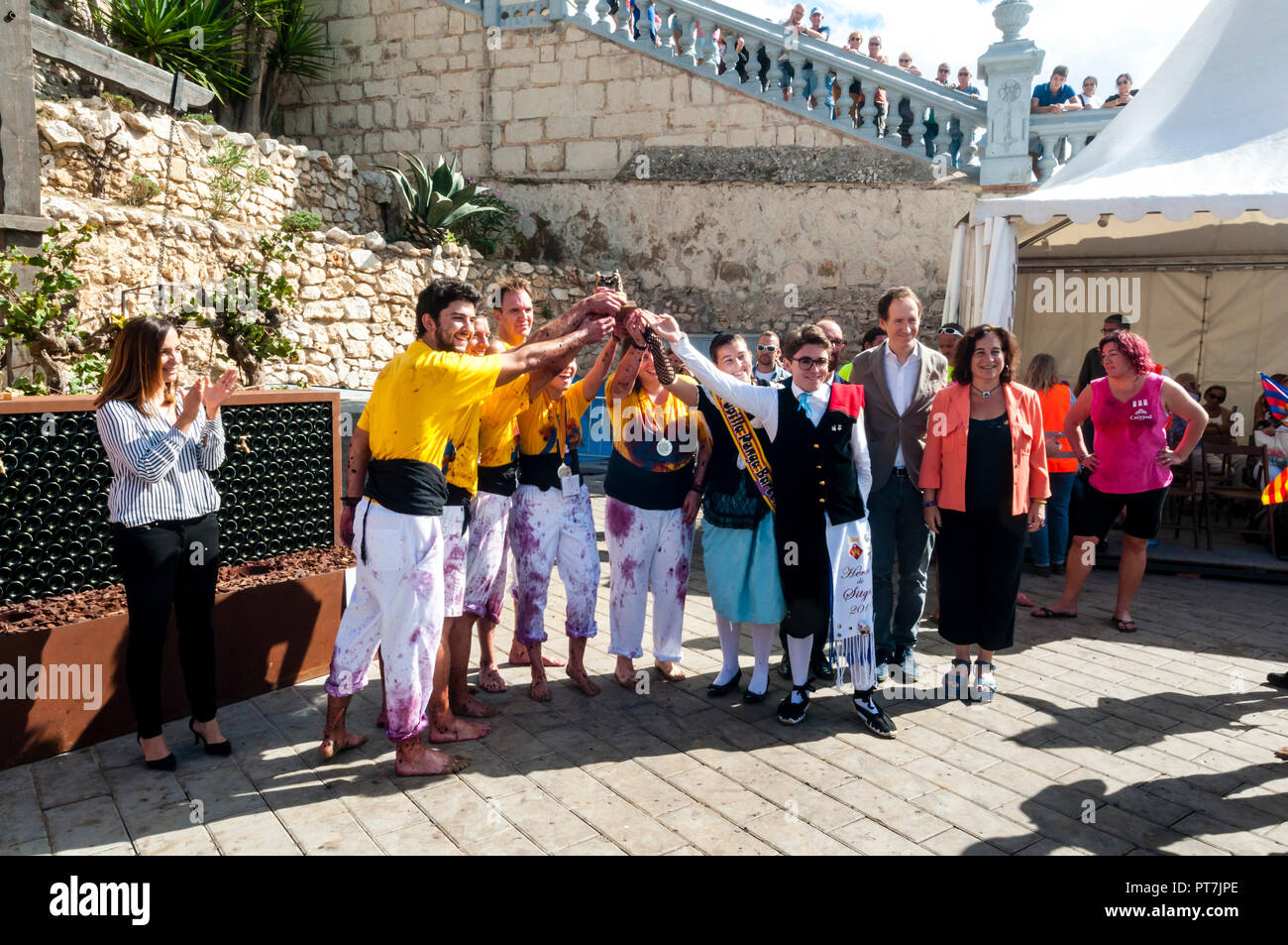 Sitges, Spain. 07th Oct, 2018. 40th Grape Stomping Competition is one of the events held within the traditional 57th harvest festival, which is traditionally celebrated in Sitges, in the Plaza de la Fragata. Seconds classified of the contest of Grape Stomping Competition. Credit: Cisco Pelay / Alamy Live News. Stock Photo