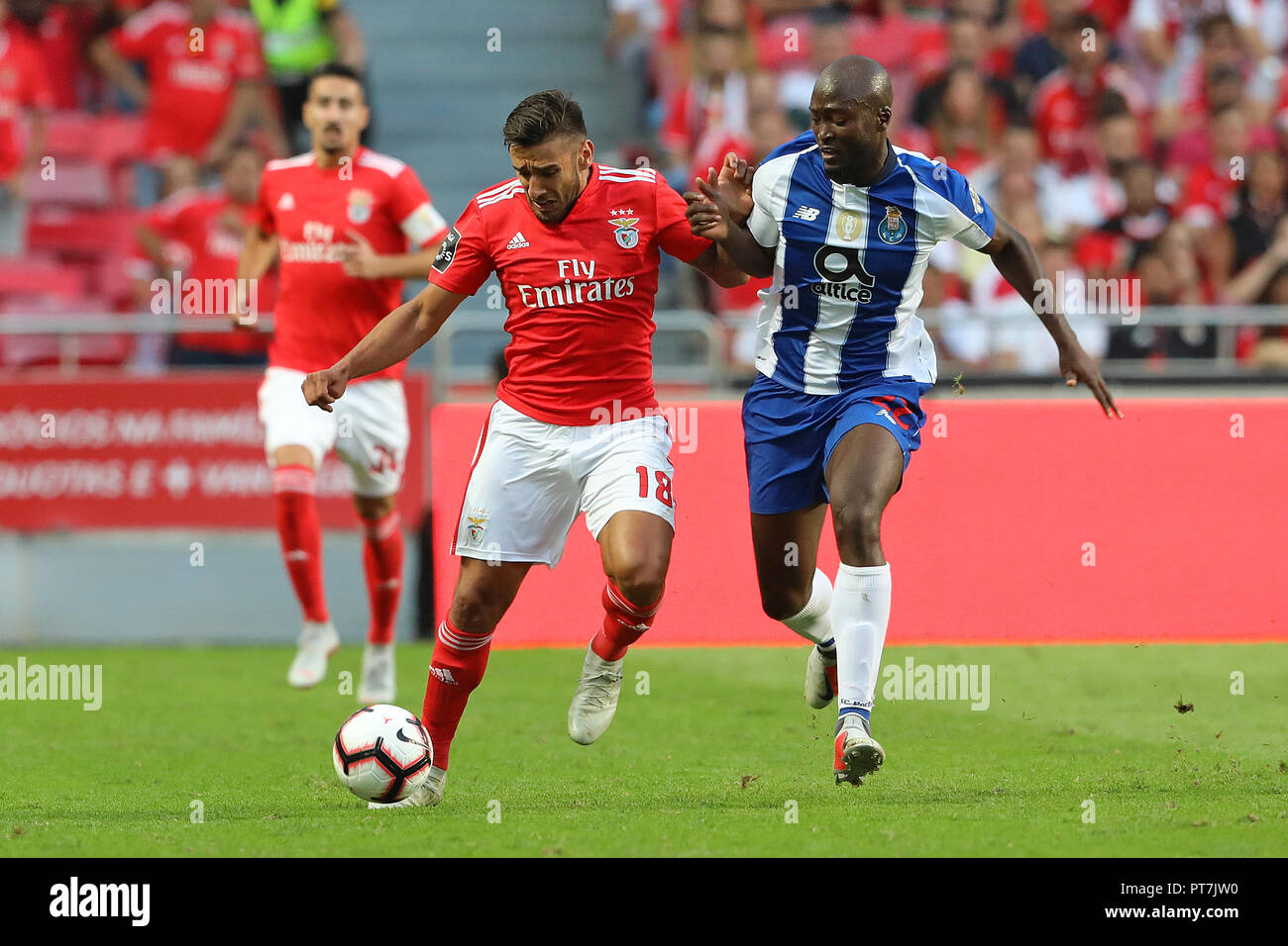 Lisbon, Portugal, Portugal. 7th Oct, 2018. Toto Salvio of SL Benfica (L)  with Danilo Pereira of FC Porto (R) seen in action during League NOS  2018/19 football match between SL Benfica vs