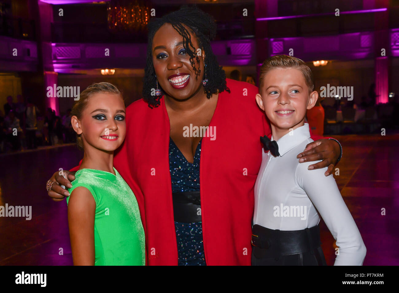 London, UK. 7th Oct 2018. Chizzy Akudolu, Nathan Storey of Strictly School Dancing Ltd and Olivia Smorga of Nice n Easy - Dance Studios in Bournemouth winner of the Paul Killick - Killick Royale Championships 2018 at The Grosvenor House Hotel, London, UK. 7 October 2018. Credit: Picture Capital/Alamy Live News Stock Photo