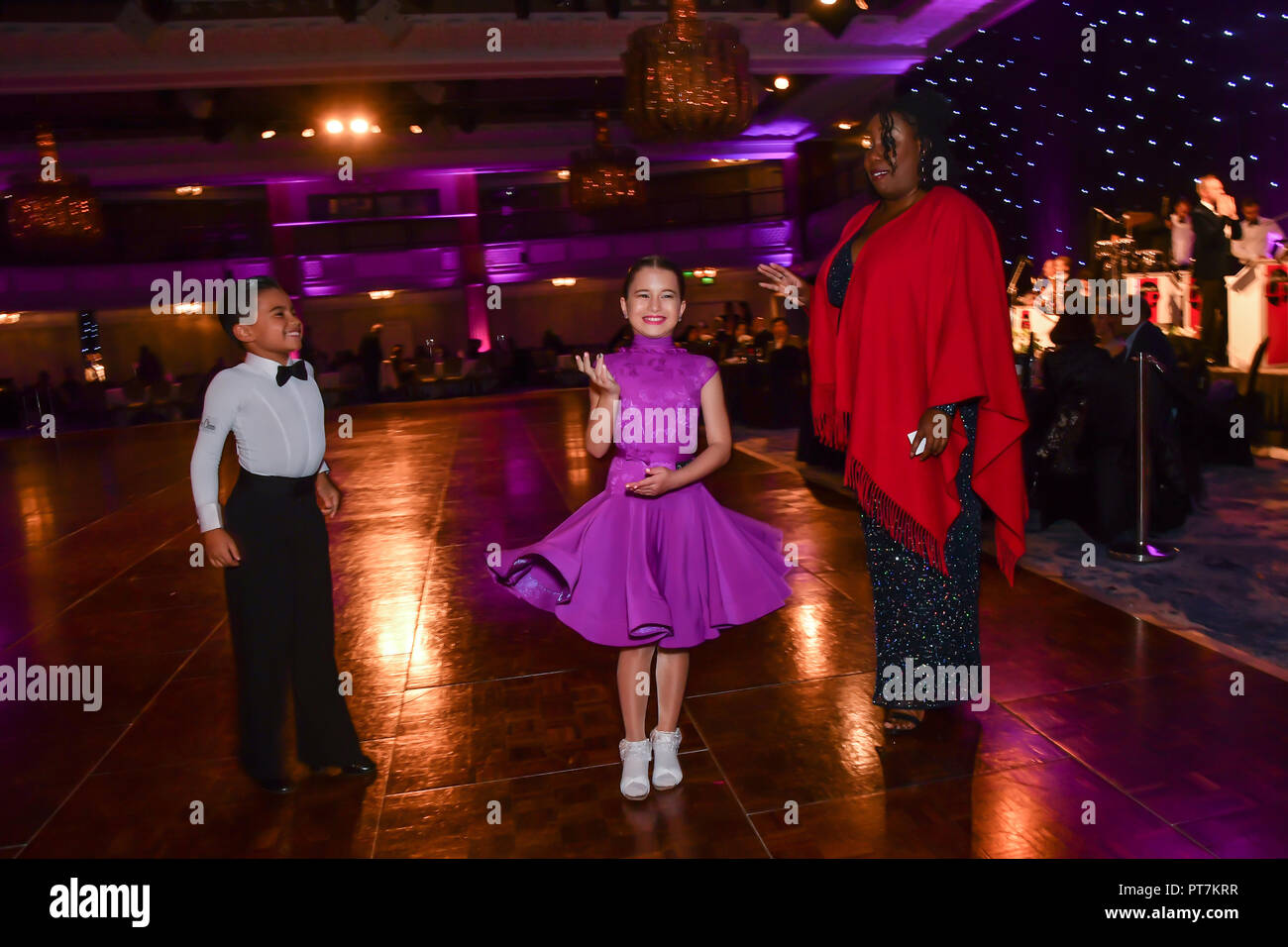 London, UK. 7th Oct 2018. Chizzy Akudolu and dances  at the Paul Killick - Killick Royale Championships 2018 at The Grosvenor House Hotel, London, UK. 7 October 2018. Credit: Picture Capital/Alamy Live News Stock Photo