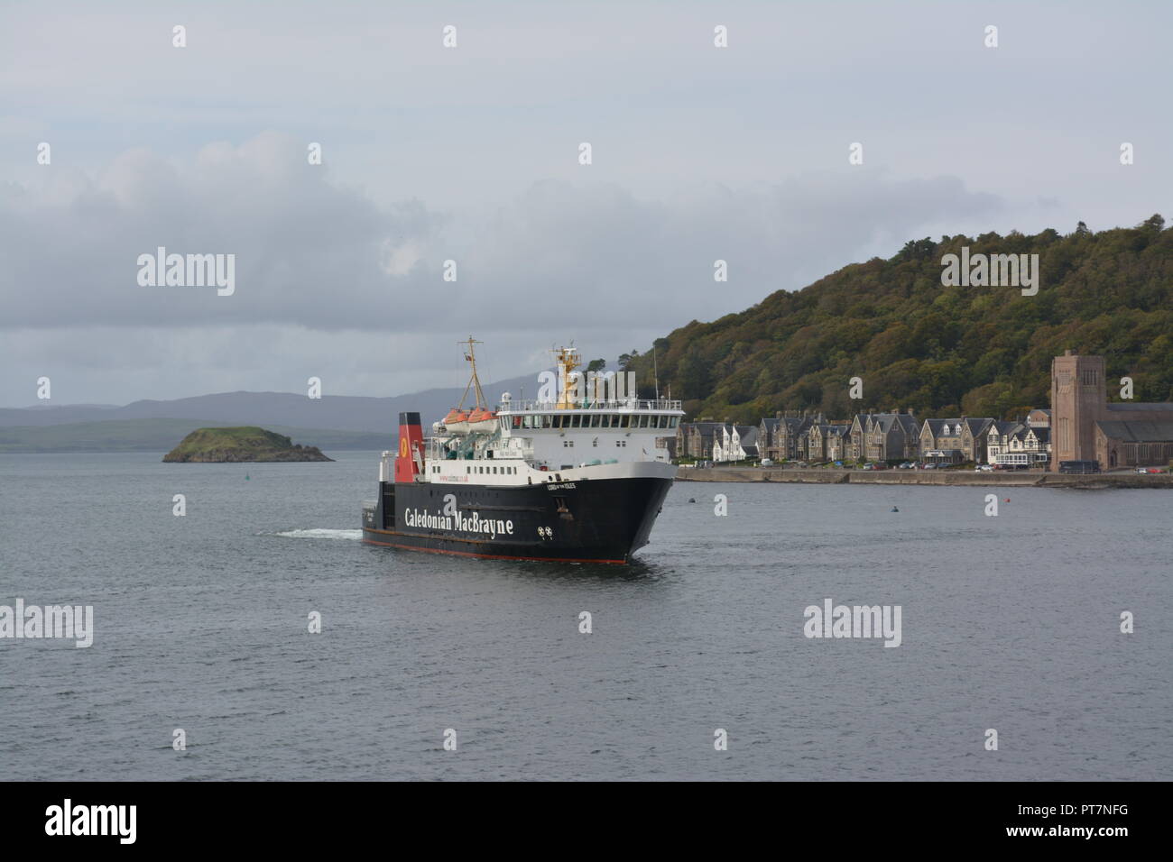 Caledonian MacBrayne ferry coming into dock at Oban West Coast of Scotland re island hopping vacations holidays method of sea travel Stock Photo