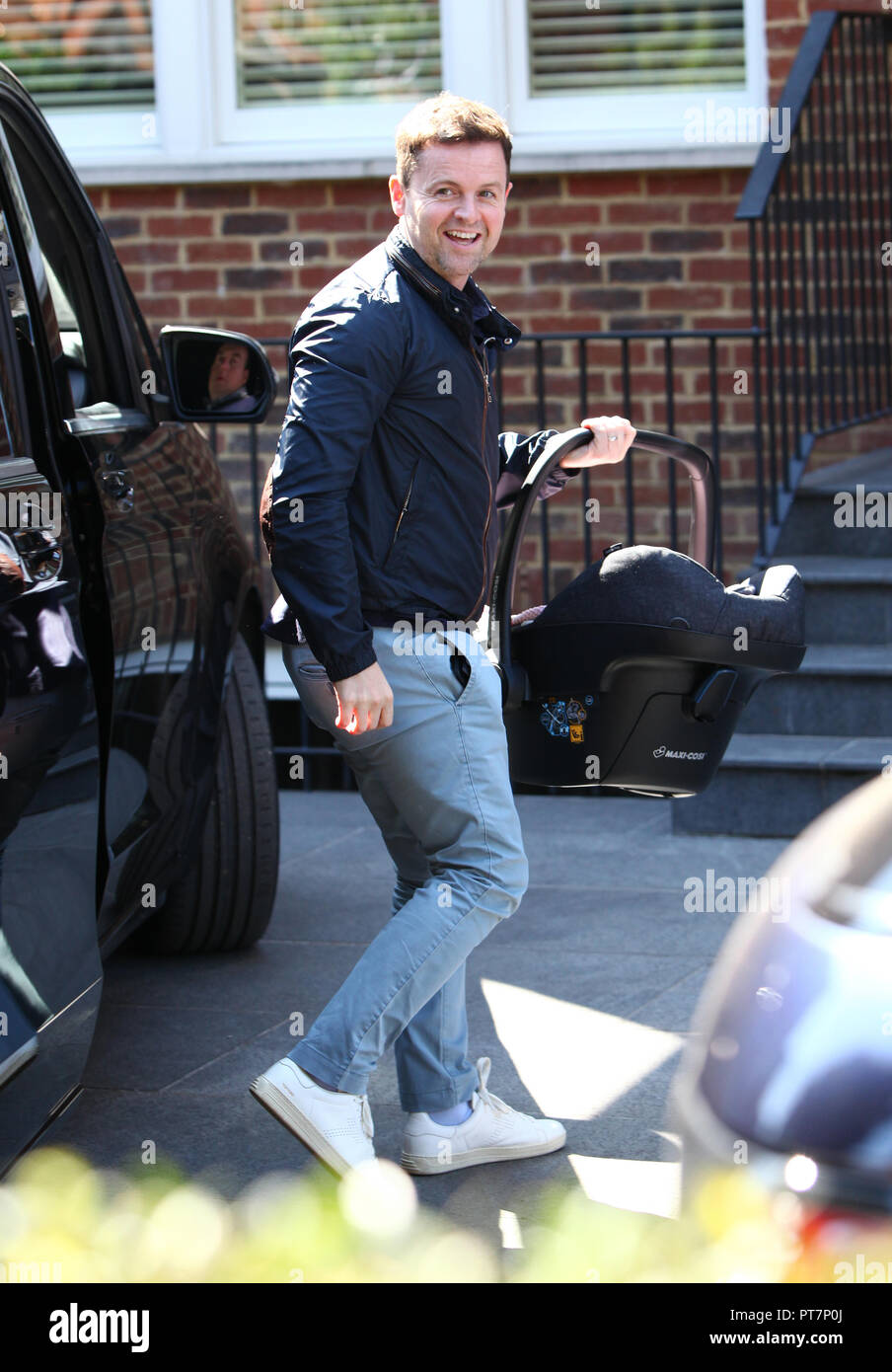 Declan Donnelly and his wife Ali Astall arrive home with their new baby ...