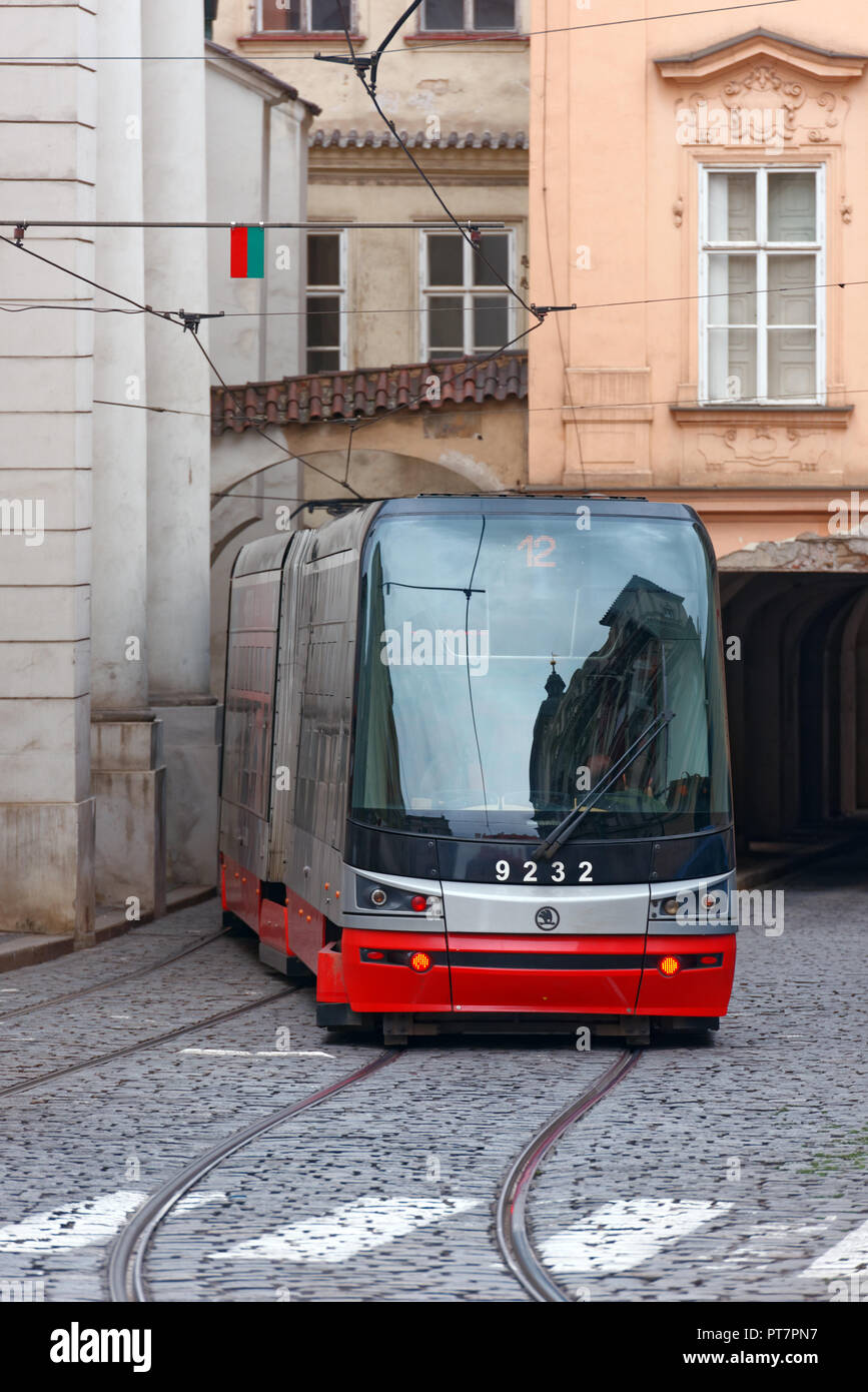 Prague, Czech Republic - September 14, 2018: Tram Skoda 15T ForCity on a narrow street in the city center. As of 2017, the Prague tram network is the  Stock Photo