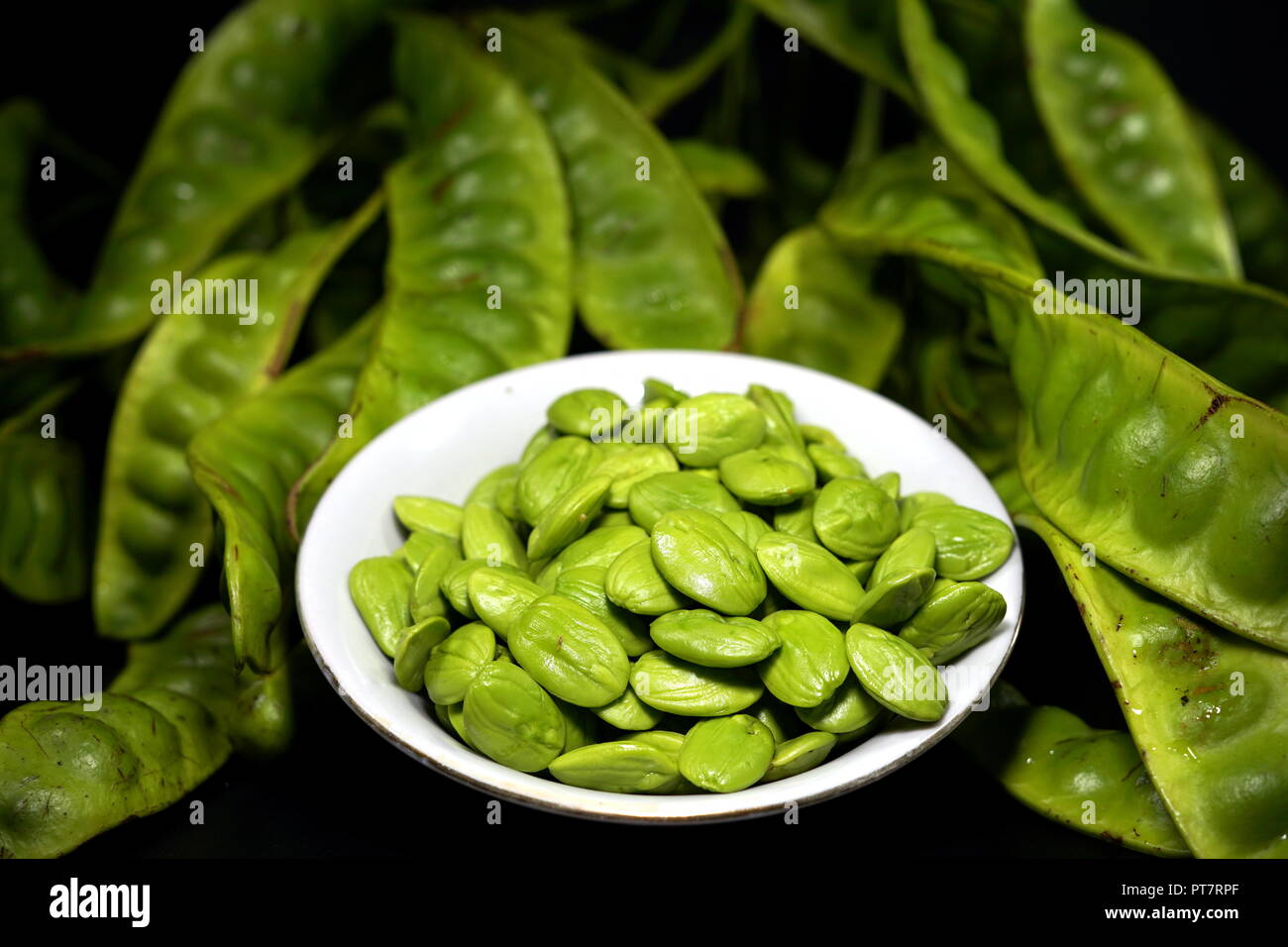 Twisted cluster bean, Parkia speciosa bean or bitter bean Stock Photo