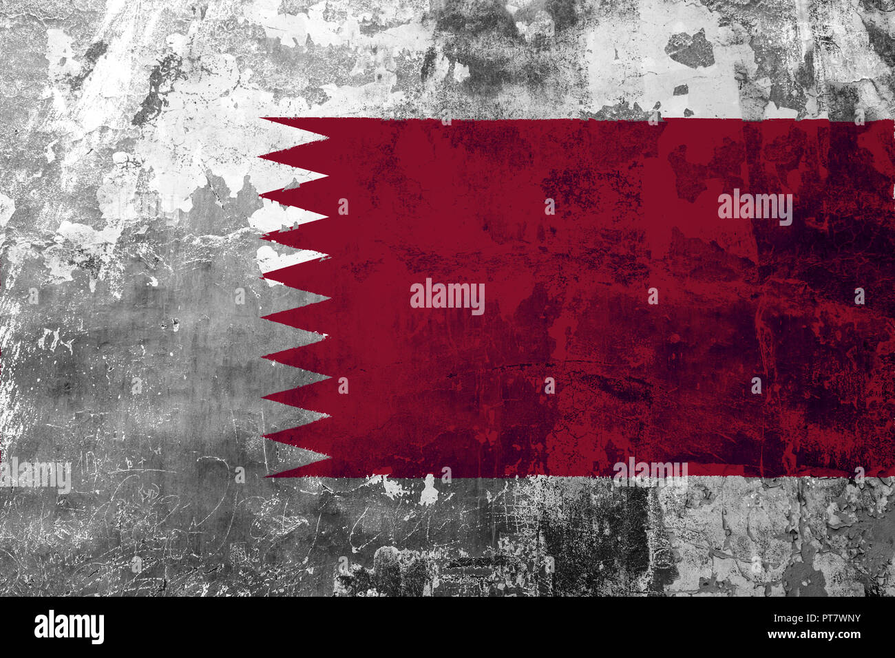 National flag of Qatar on the background of the old wall covered with ...