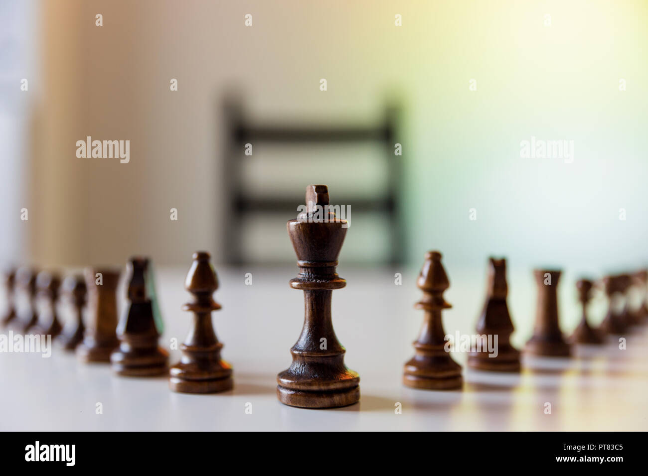 planning strategy with chess figures on table. Strategy, leadership and teamwork concept. Stock Photo