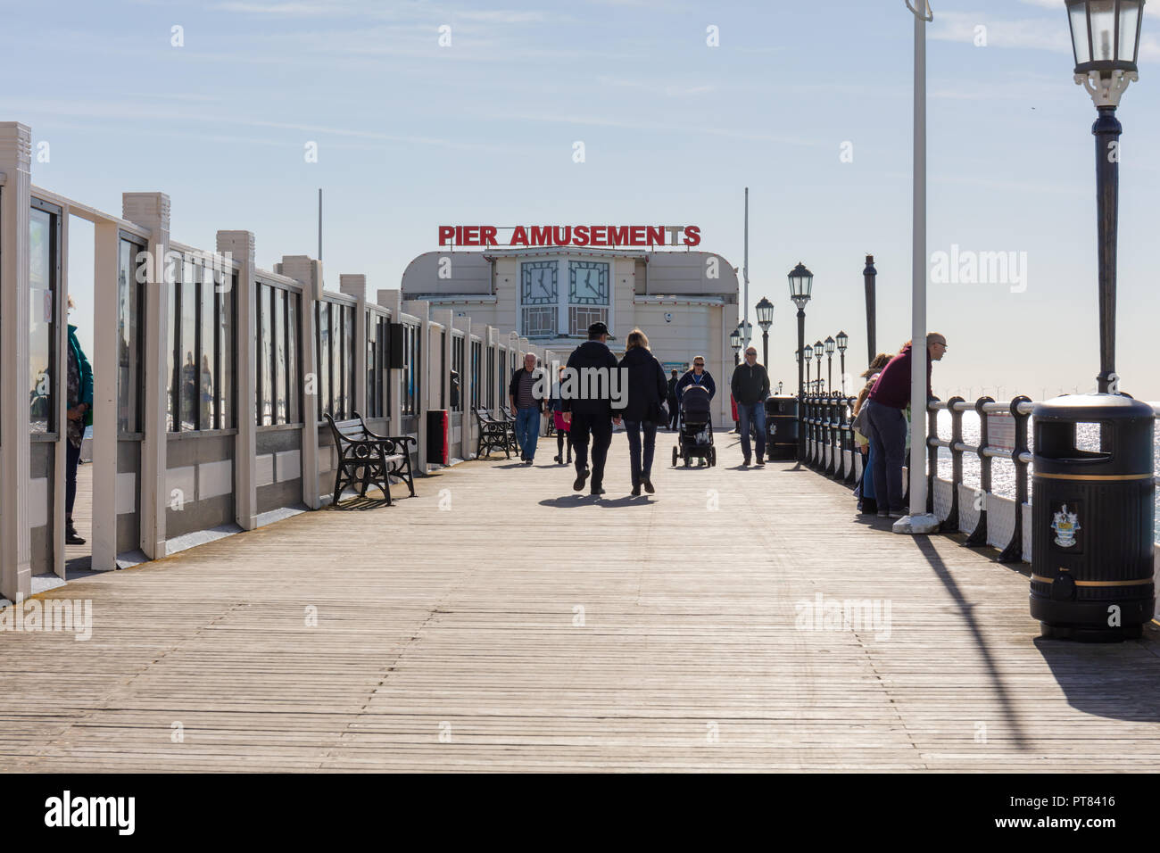 Worthing, Sussex, UK; 7th October 2018; People Strolling along the Pier in Bright Sunny Weather Stock Photo