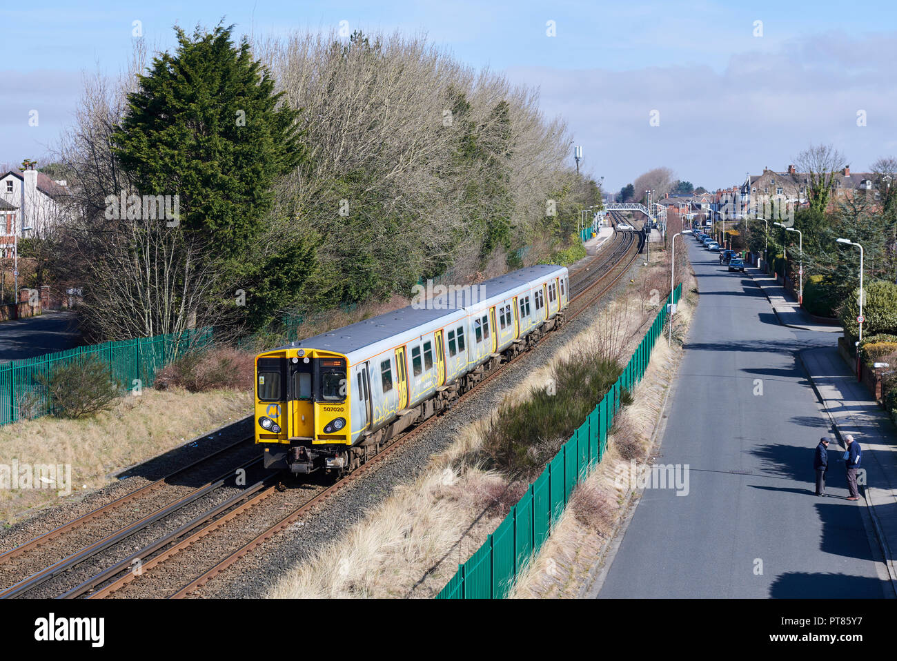 507 020 is seen heading out of Ainsdale with 2U24 11:28 Southport to Hunts Cross. 25th March 2018 Stock Photo