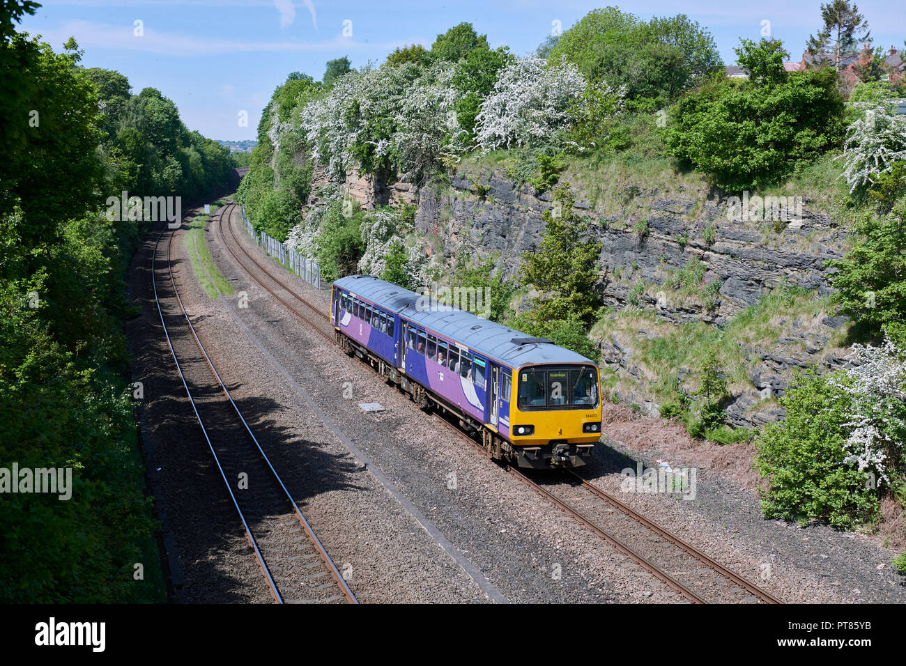 144013 heads Northern Trains 2O69 11:31 Huddersfield - Wakefield Westgate at Horbury. May 15th 2018. Stock Photo