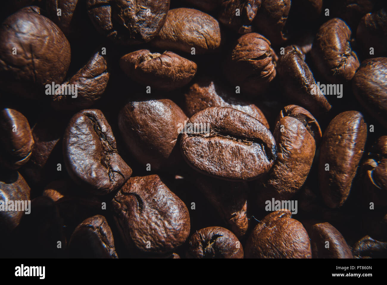 Close up coffee beans background with texture Stock Photo - Alamy