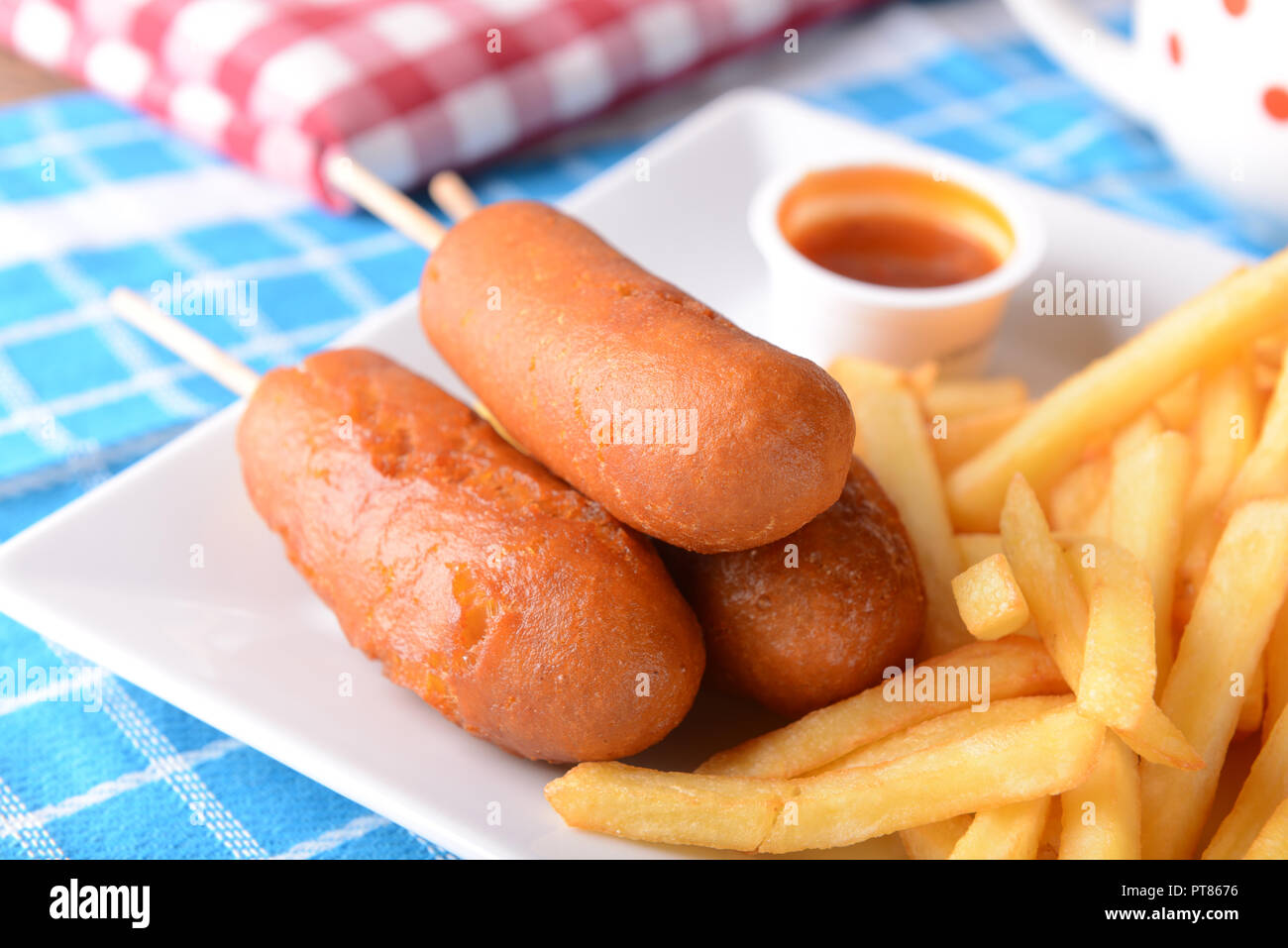 Corn dogs with fries Stock Photo Alamy