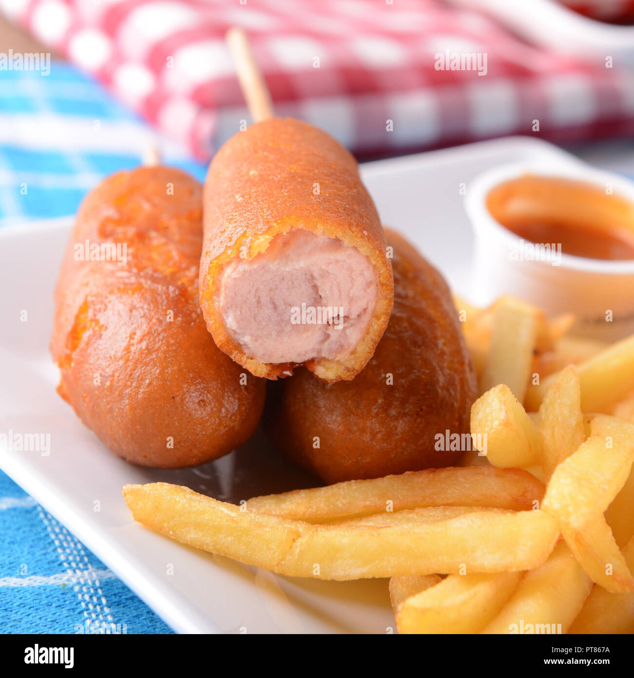 Corn dogs with fries Stock Photo Alamy