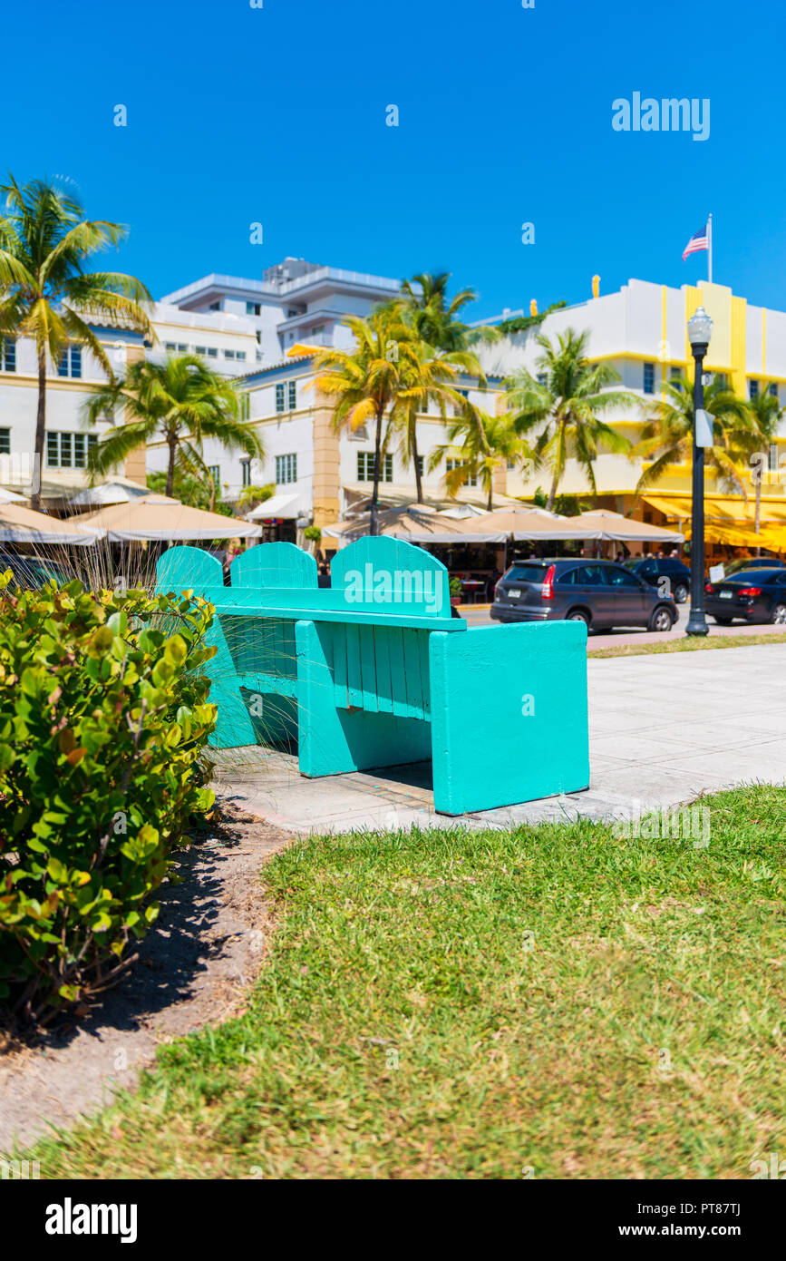 Bench on Sidewalk near Ocean Drive in Miami South Beach Florida USA Stock Photo