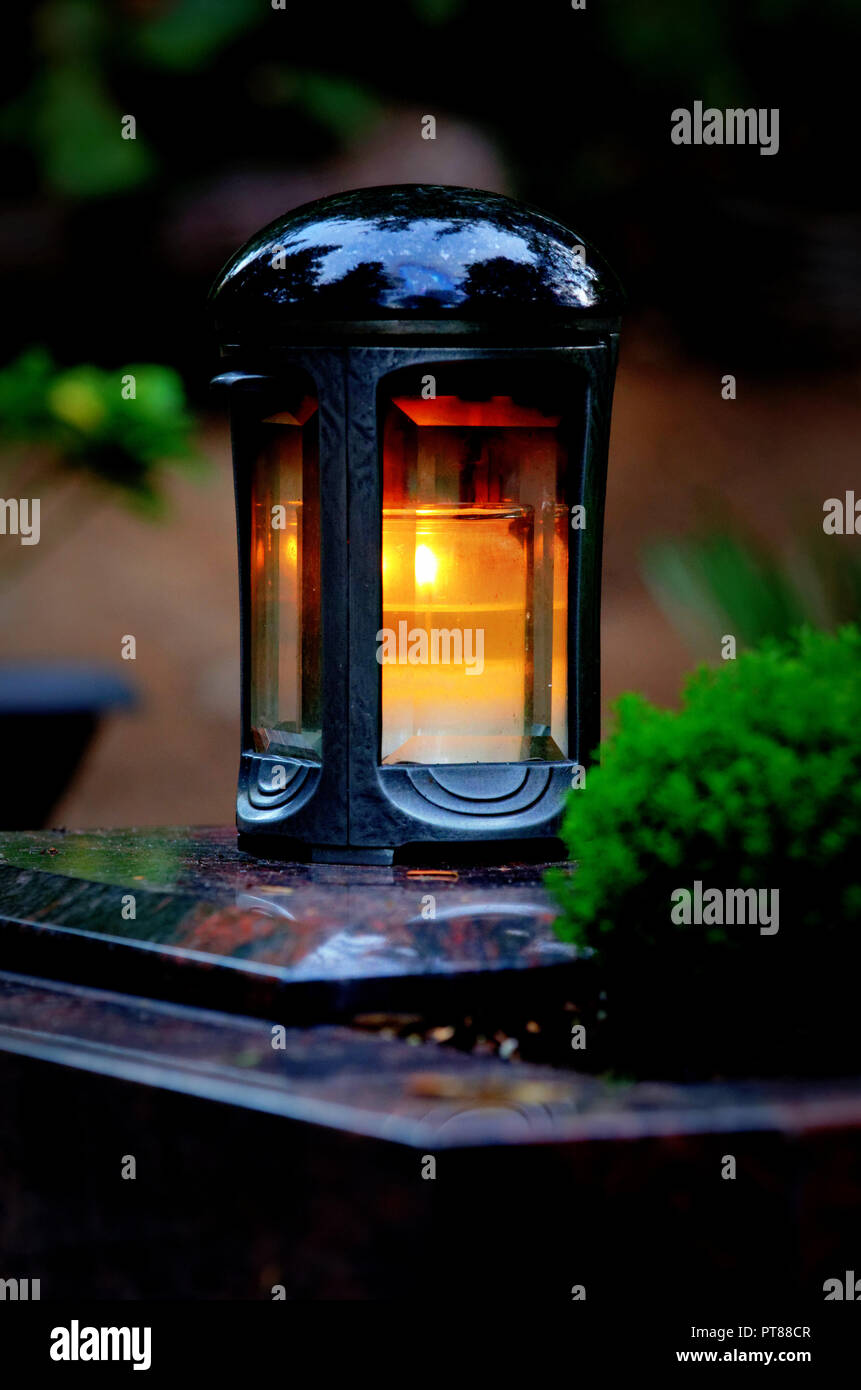grave lantern with burning candle Stock Photo Alamy