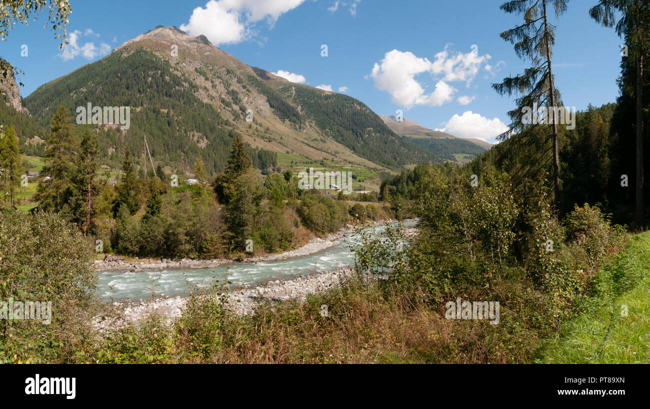 The Inn river as it flows past Susch (or Sus) Zernez, municipality in the district of Inn in the Swiss canton of Graubünden. Model release available Stock Photo