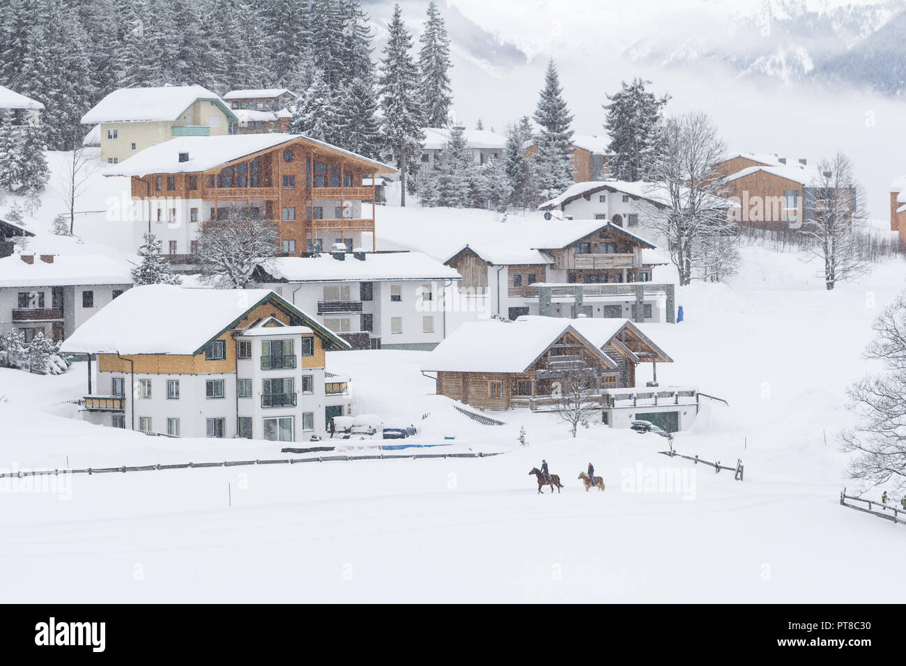 austrian snow covered winter village Stock Photo