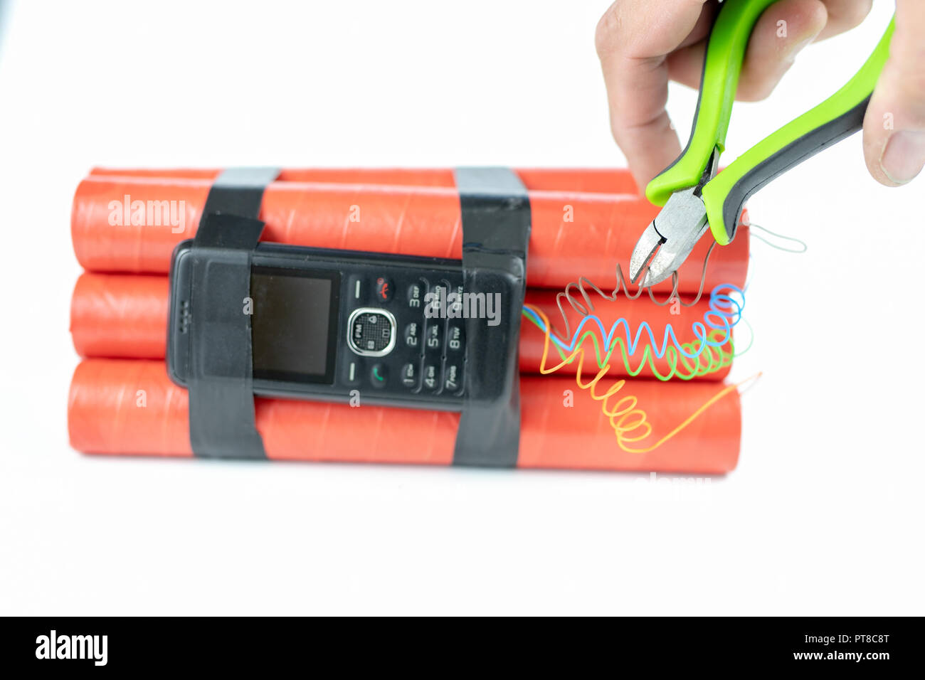 Dynamite Sticks With Time Igniter Explosive Material With Ignition Connected To A Mobile Phone White Background Stock Photo Alamy