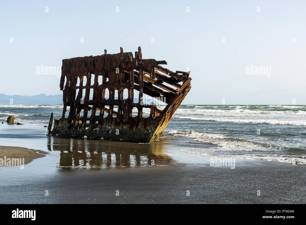Peter Iredale Shipwreck on late afternoon, Clatsop Spit, Fort Stevens State Park, Pacific Coast, Astoria, Oregon, USA. Stock Photo