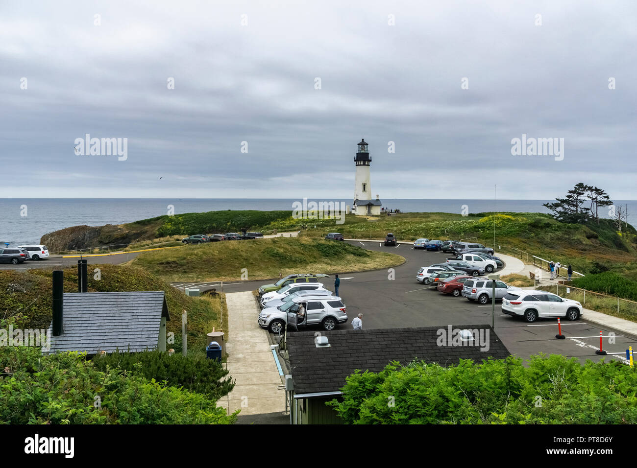 Yaquina Head Lighthouse and parking lot, Newport, Pacific Coast, Oregon, USA. Stock Photo