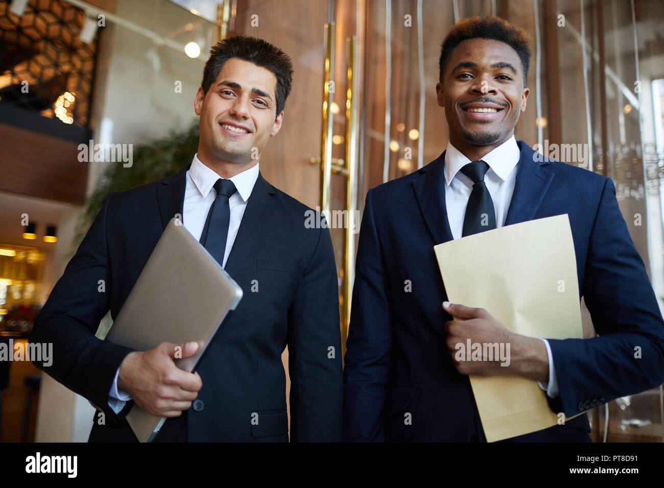 Business men black suits hi-res stock photography and images - Alamy