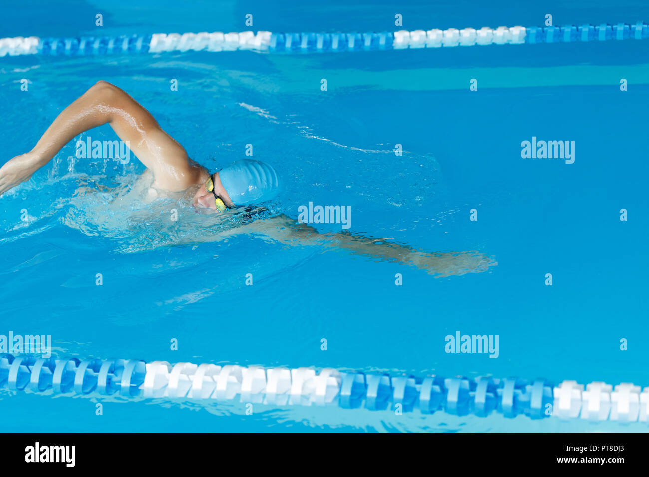 professional freestyle swimmer in swimming pool Stock Photo