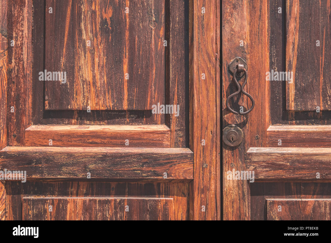 old  wood door closeup with metal knob Stock Photo