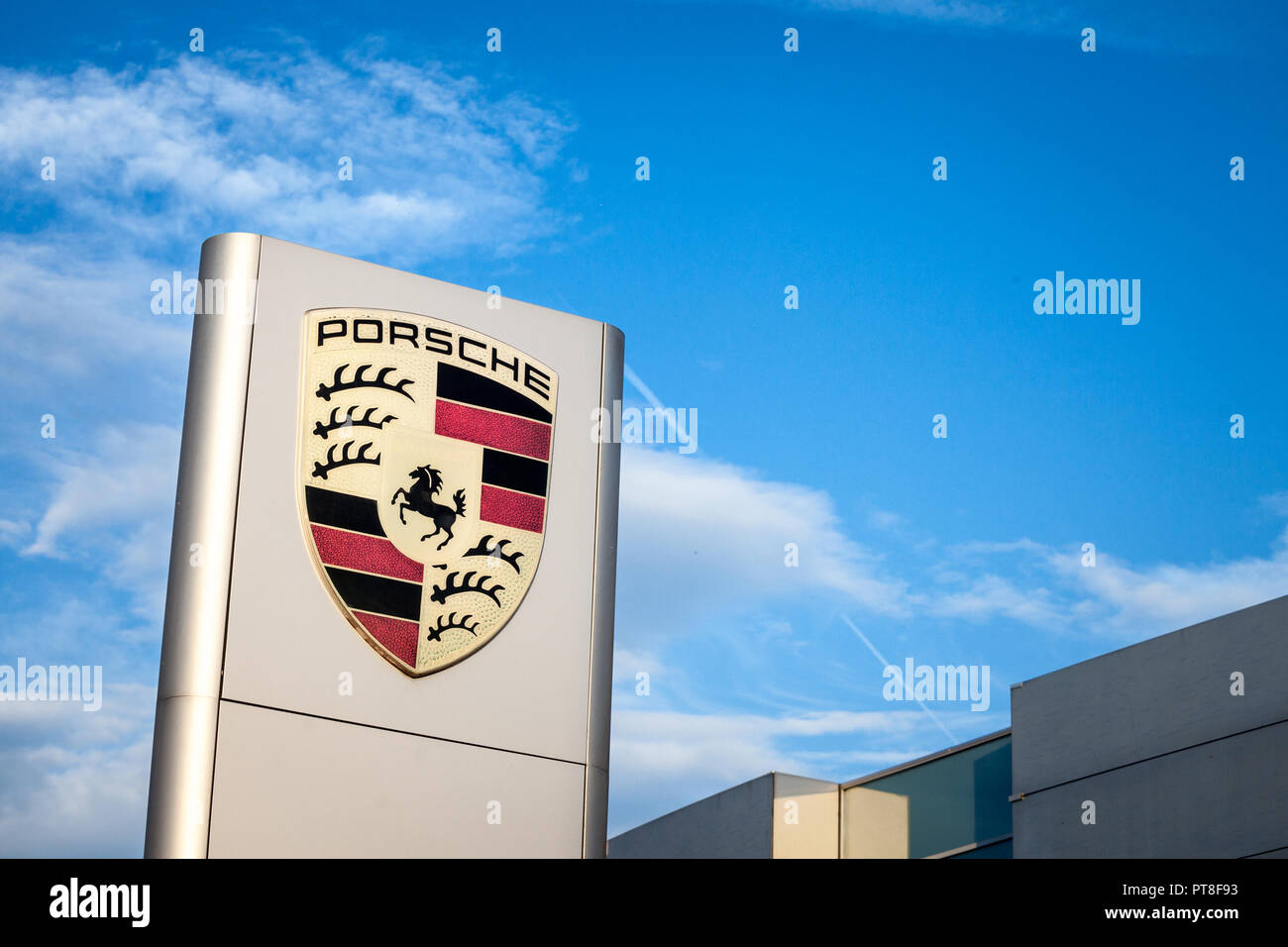 BELGRADE, SERBIA - OCTOBER 7, 2018: Porsche logo on their main dealership store in Belgrade. Porsche is a German car and automotive manufacturer, spec Stock Photo