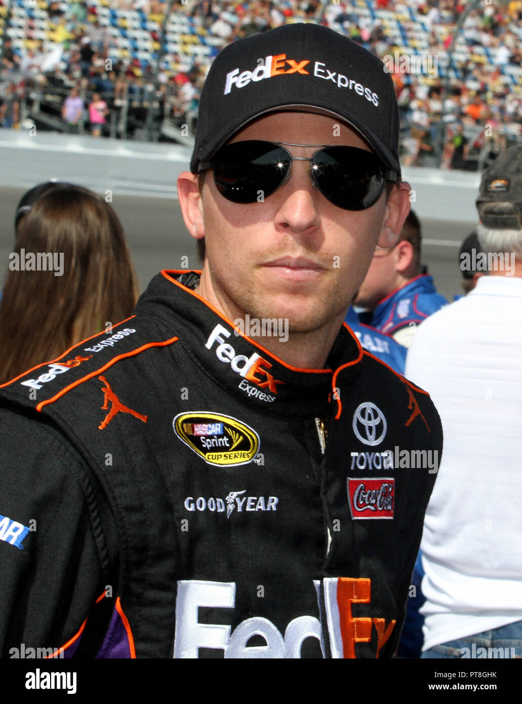 Denny Hamlin waits on pit road for the start of the NASCAR Sprint Cup Budweiser Duel #1, at Daytona International Speedway in Daytona, Florida on February 21, 2013. Stock Photo