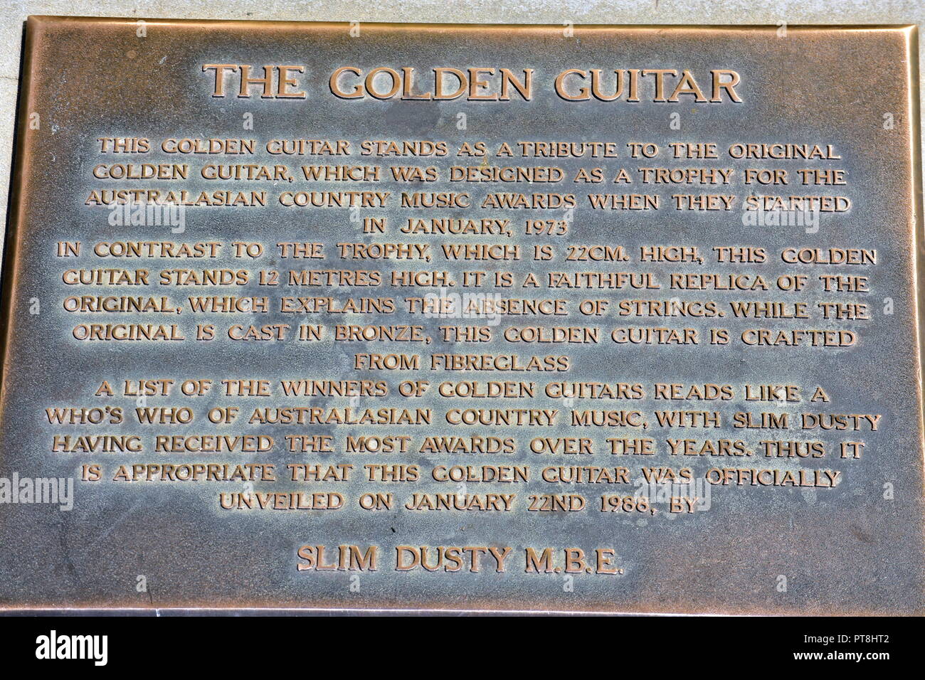 Golden guitar plaque Stock Photo