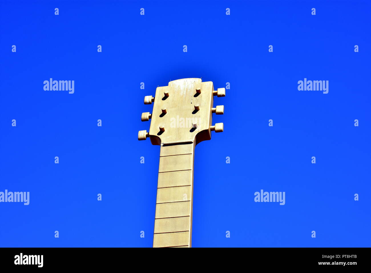 Golden guitar. Stock Photo