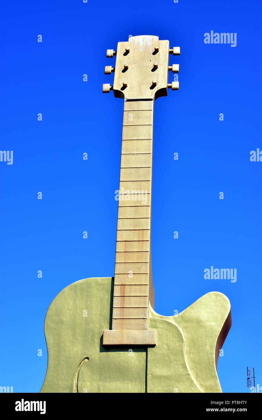 Golden guitar. Stock Photo