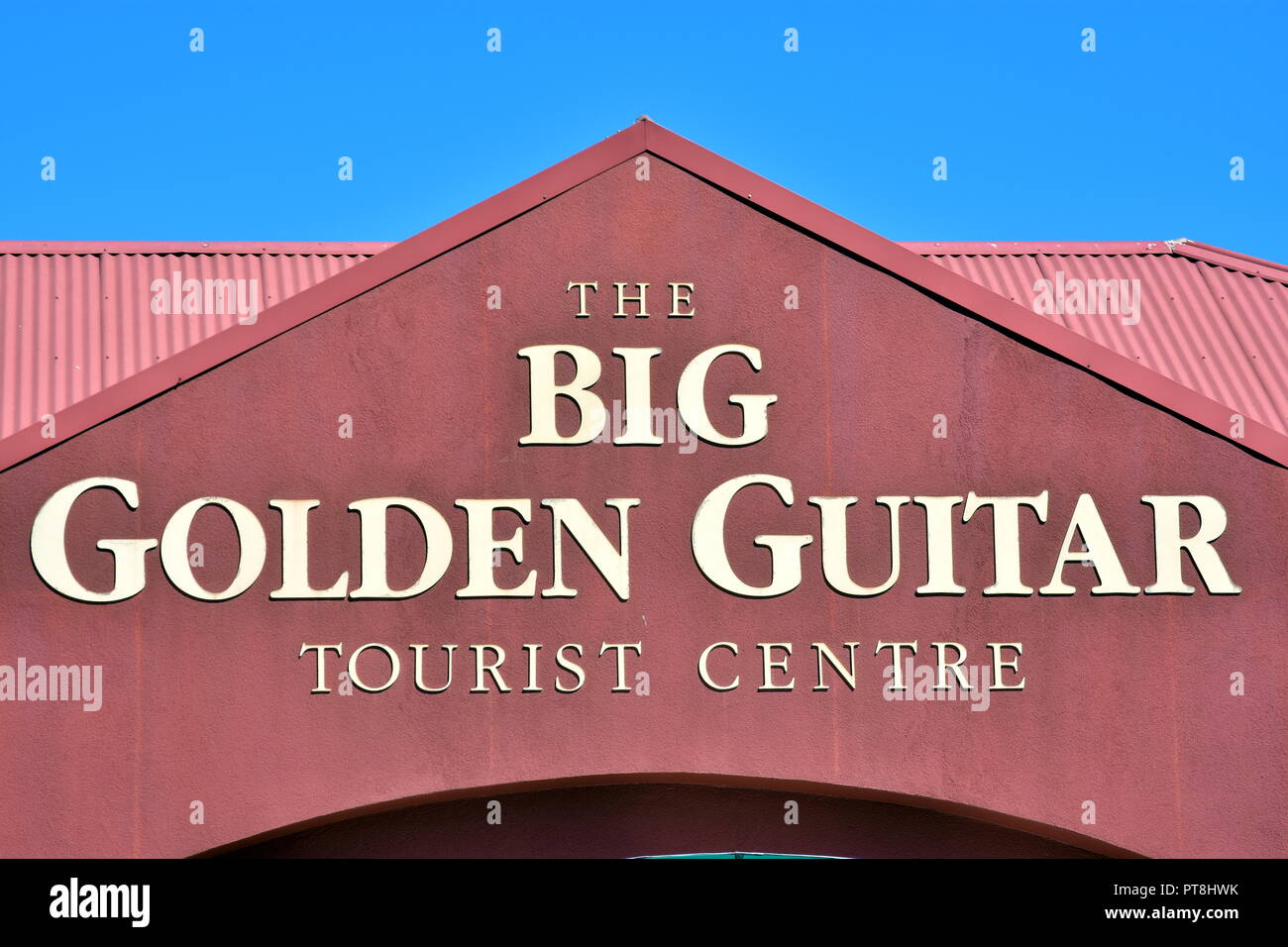 Big golden guitar. Stock Photo