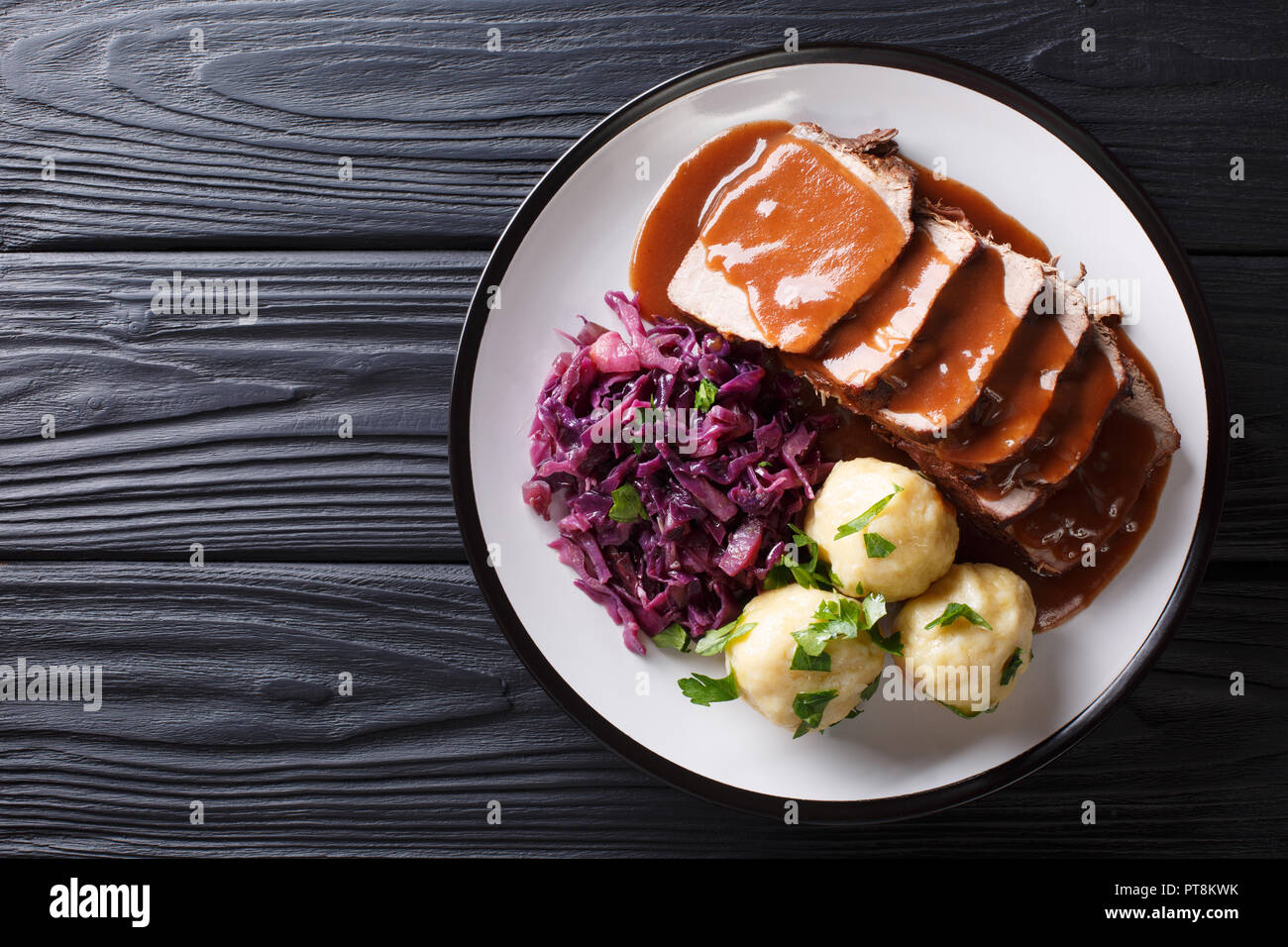 Festive German full dinner Sauerbraten beef stew with gravy served