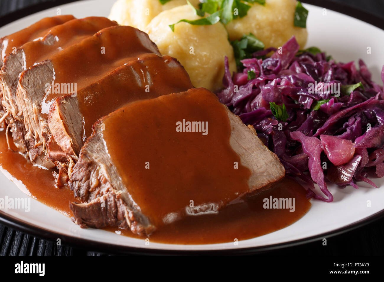 Sauerbraten meat and potato dumpling hi-res stock photography and ...