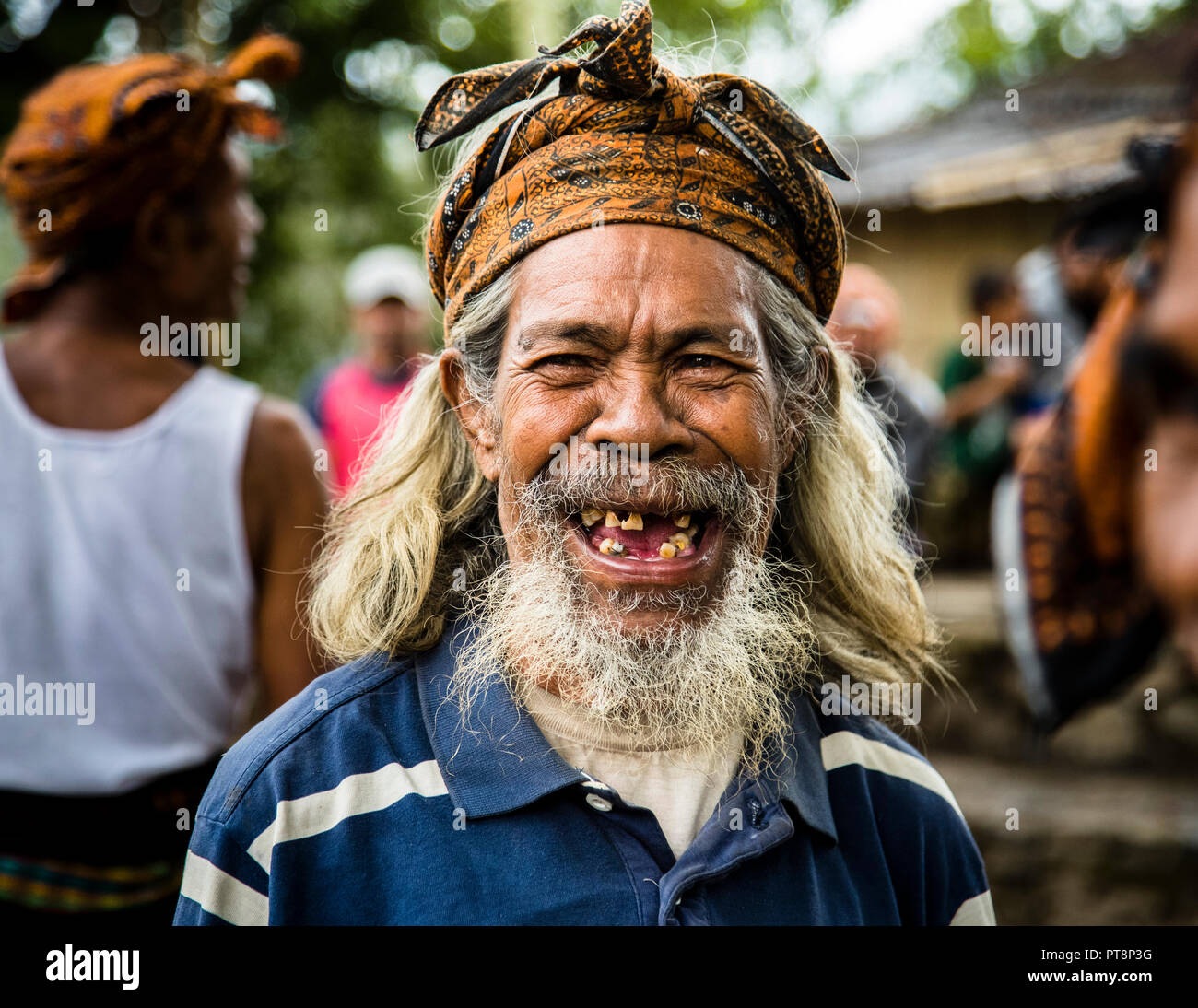 Humorous exchange between cultures, Sunda Islands, Indonesia Stock Photo