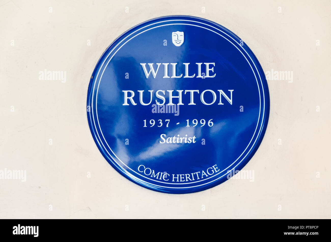 Comic Heritage blue plaque at Mornington Crescent station commemorates Willie Rushton. A reference to the radio programme I'm Sorry I Haven't a Clue. Stock Photo