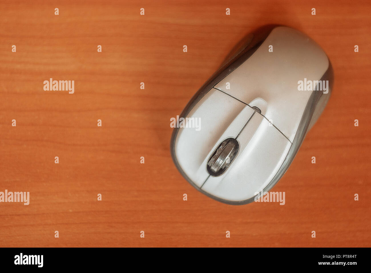 Wireless computer mouse on a table top view, copyspace Stock Photo Alamy